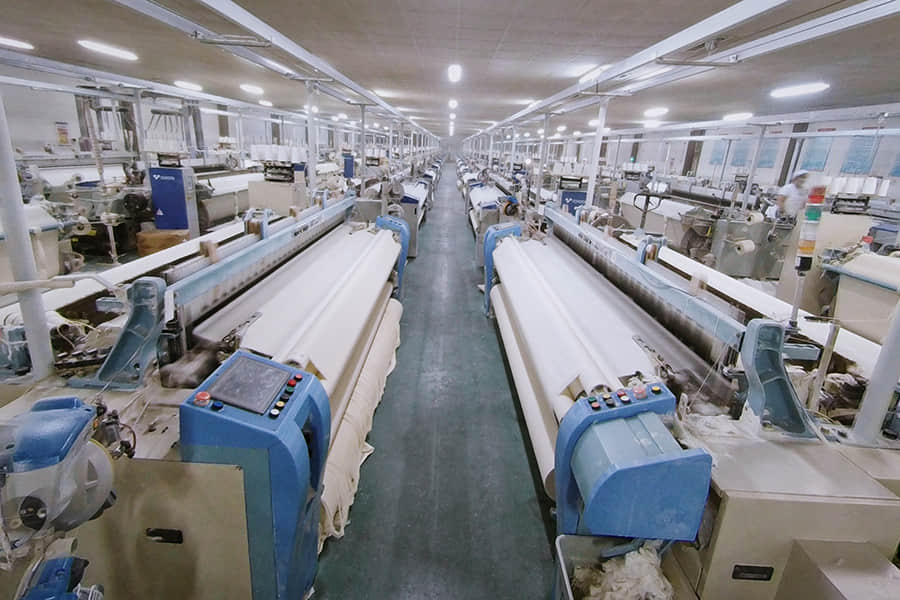 Partial Panorama of Aomian Textile Weaving Workshop in 3 by 2 Aspect Ratio
